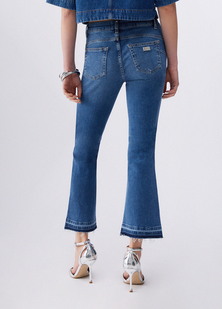 jeans bootcut à ourlets non finis