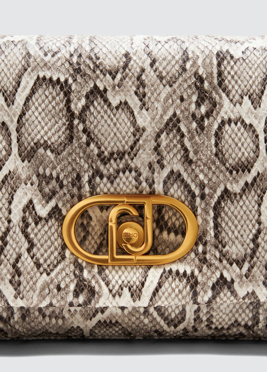 grand sac de voyage en peau de serpent