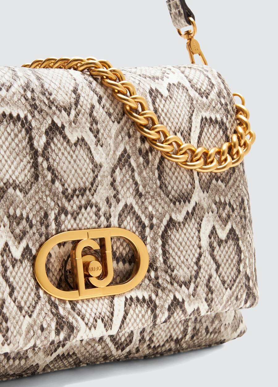 grand sac de voyage en peau de serpent