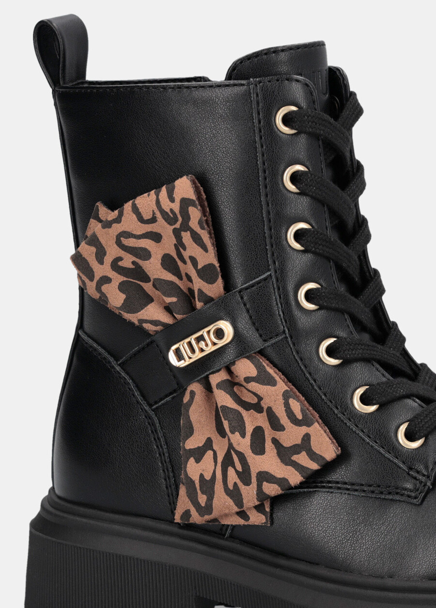 bottes de combat avec nœud papillon à imprimé animal