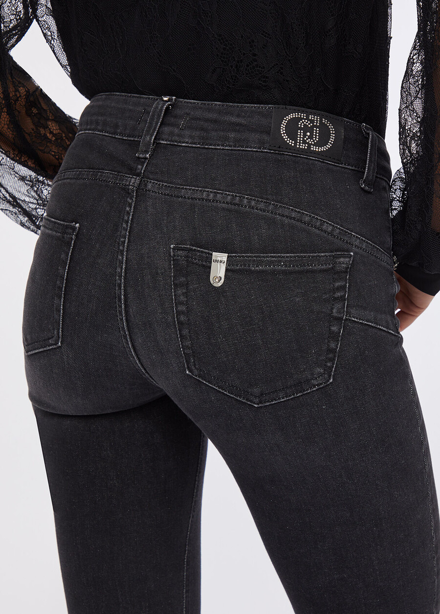 jeans slim ornés de pierres précieuses