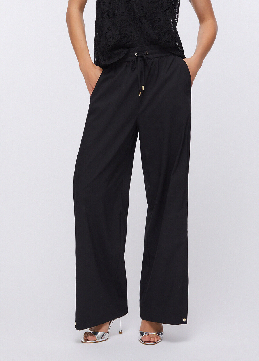 pantalon avec détails fendus