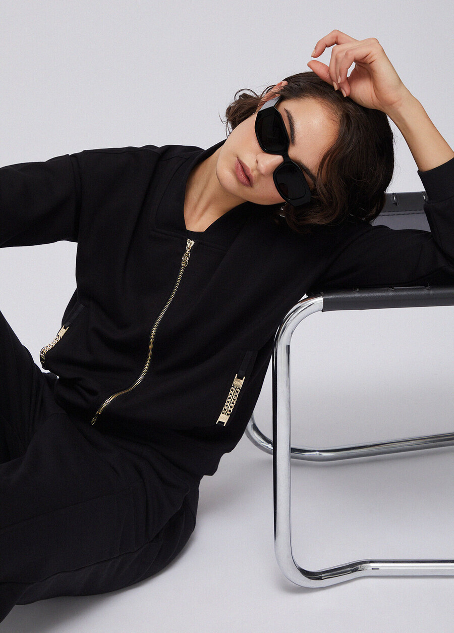 sweat-shirt avec fermeture éclair et détails de chaîne