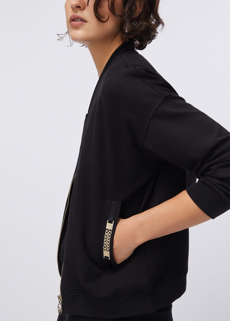 sweat-shirt avec fermeture éclair et détails de chaîne