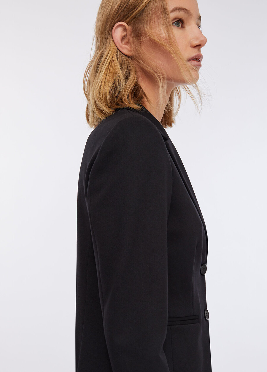 veste avec ceinture de marque