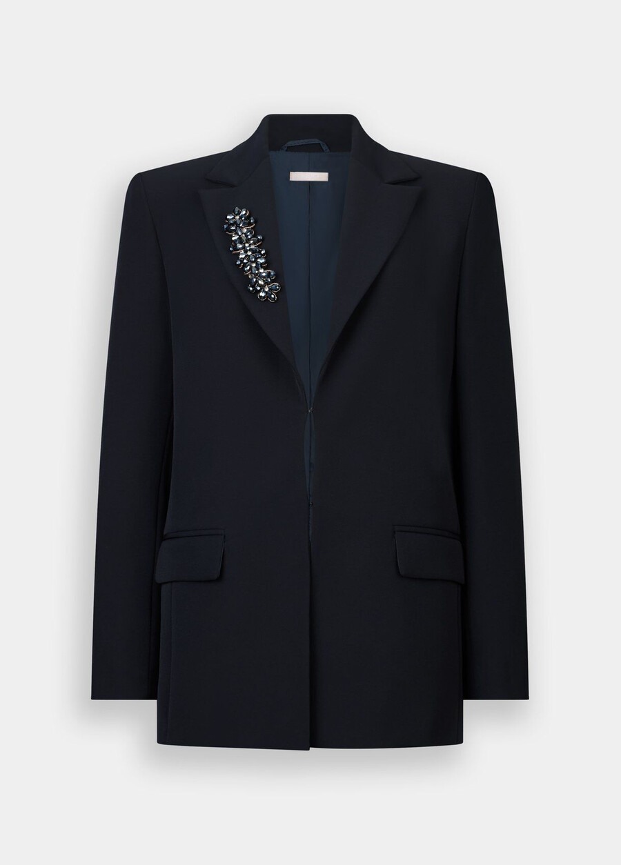 veste longue ornée de broderies de bijoux