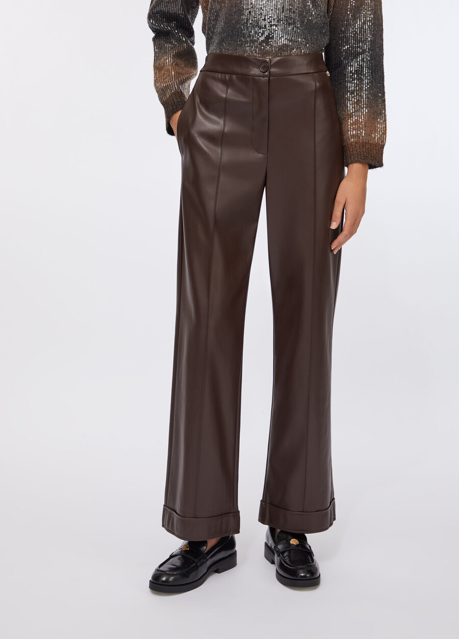 pantalon en tissu enduit
