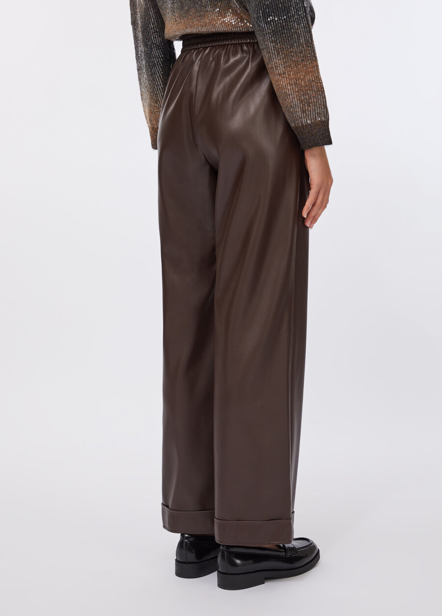 pantalon en tissu enduit