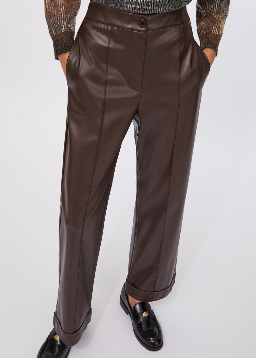 pantalon en tissu enduit